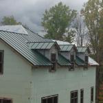 Standing-seam metal roof, dormer side of home